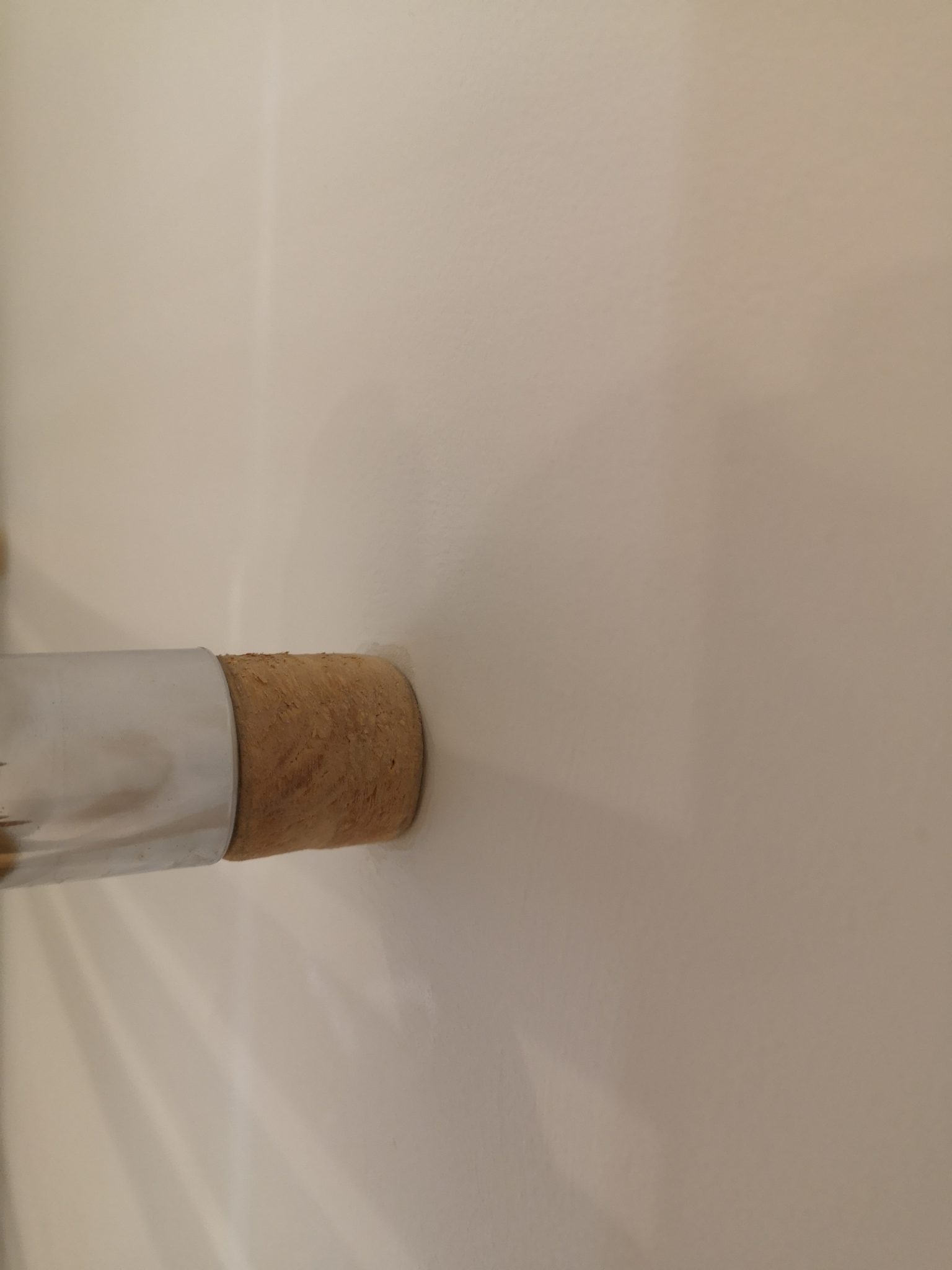 Radiator mounts need to be taped to protect them before paint in a full home redecoration