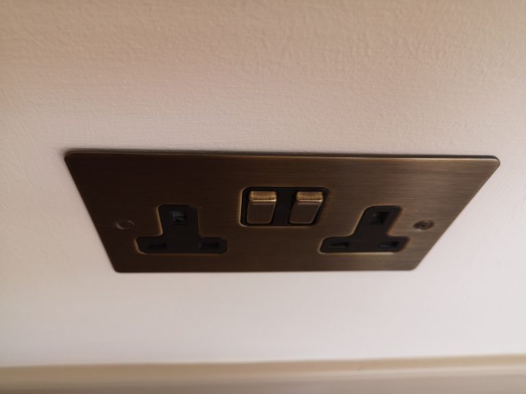 smooth wall behind a light switch